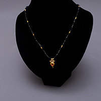 GOLD FACETTED ONYX NECKLACE