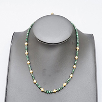 EMERALD AND GOLD NECKLACE